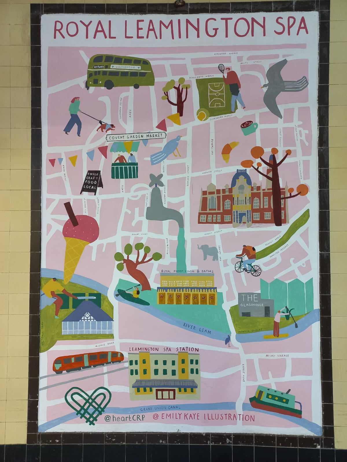 Mural of Leamington Spa with illustrations of different sports and places to visit.